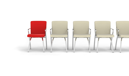 one red leather chair placed observably in a group of gray chairs.